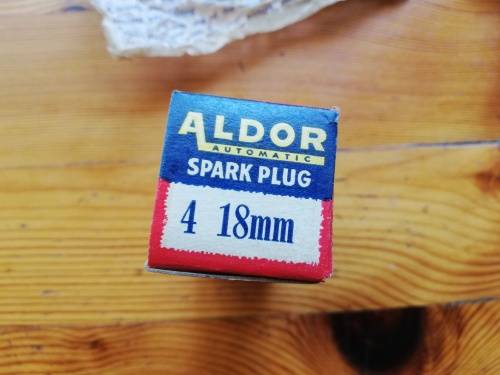 VINTAGE USED ALDOR SPARK PLUG IN BOX.  With original wax proof paper wrapper