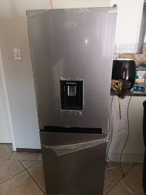 Brand new Defy 226lt fridge and freezer with water dispenser