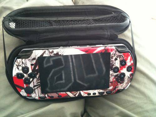 SONY PSP CONSOLE WITH 8 GAMES AND MOVIES!!!! SEE PICS BARGAIN!!!