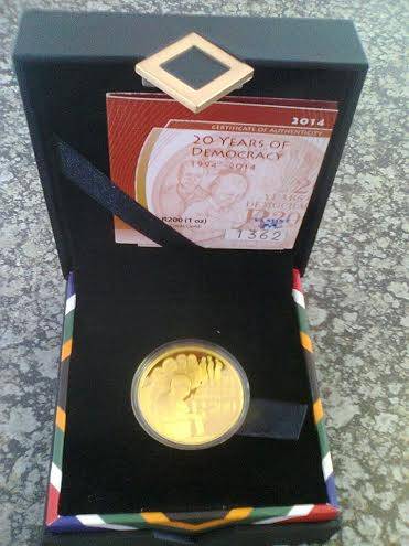 2014 1 OUNCE GOLD 20 YEAR DEMOCRACY COIN