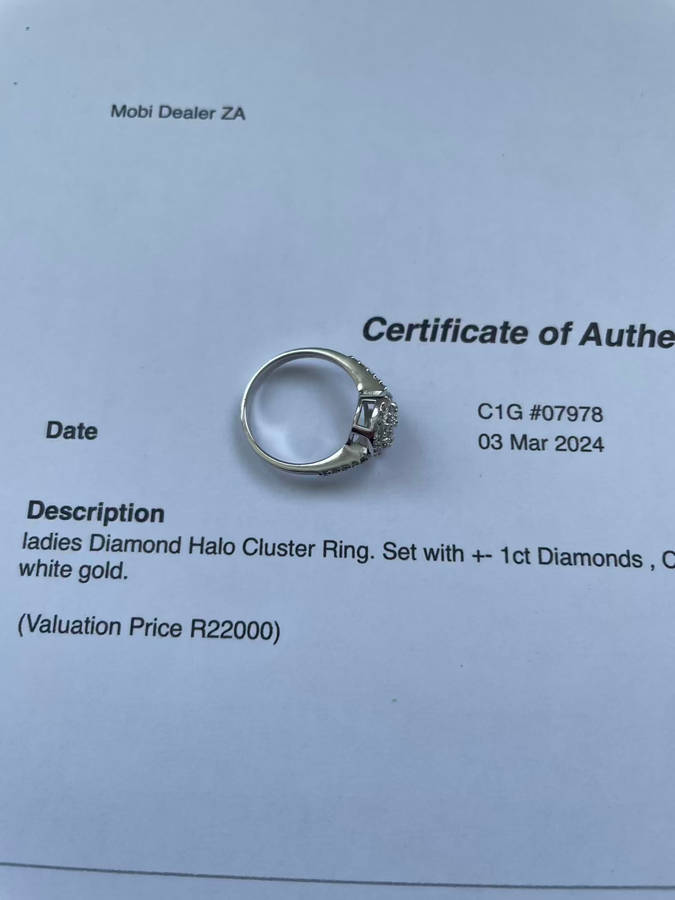ladies NWJ Diamond Ring. Set with +- 1ct Diamonds, Set in 9ct white gold. With Certificate