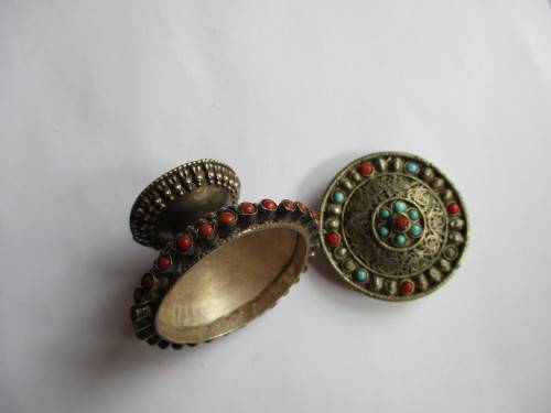 Silver Ornated with coral and turquise box -container .