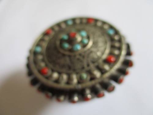 Silver Ornated with coral and turquise box -container .