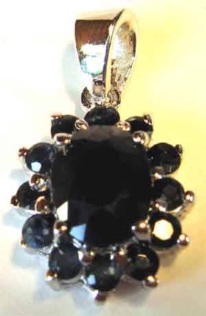 Sterling Silver and Genuine Blue Sapphires Pendant.