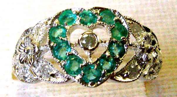 Gorgeous, Sterling Silver Ring with Genuine Emeralds and Diamonds.