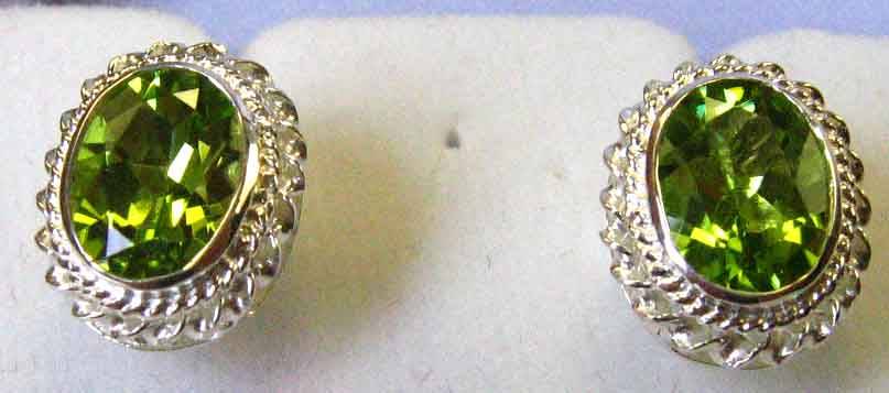 A pair of Sterling Silver and Genuine Peridots Earrings