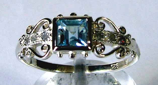 Blue Sapphire and Diamond Ring.