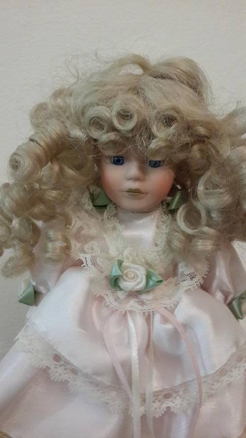 Beautiful Porcelain Doll on stand - curly blonde cherub! Studs on her shoes say Jeun Bang