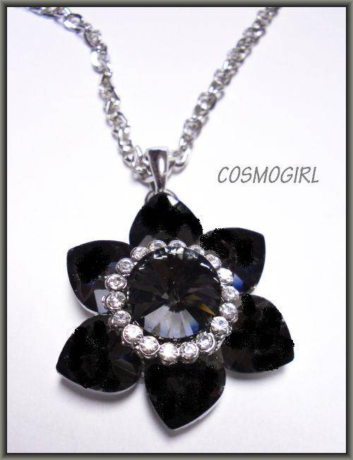 Totally irresistible crystal flower pendant with diamantes on a silver chain
