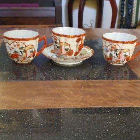 *Fine China Hand Painted Tea Cup and Two Saucers*