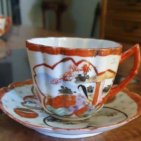*Fine China Hand Painted Tea Cup and Two Saucers*