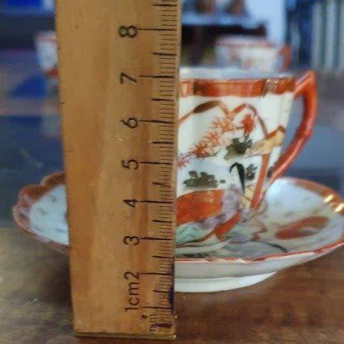 *Fine China Hand Painted Tea Cup and Two Saucers*