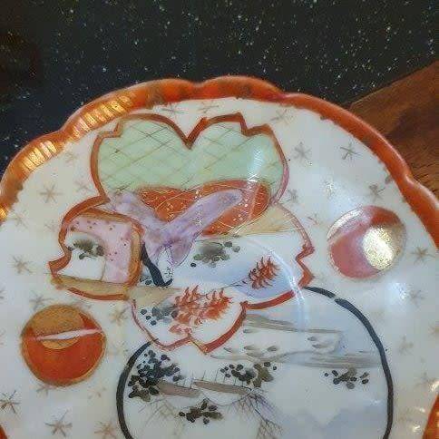 *Fine China Hand Painted Tea Cup and Two Saucers*