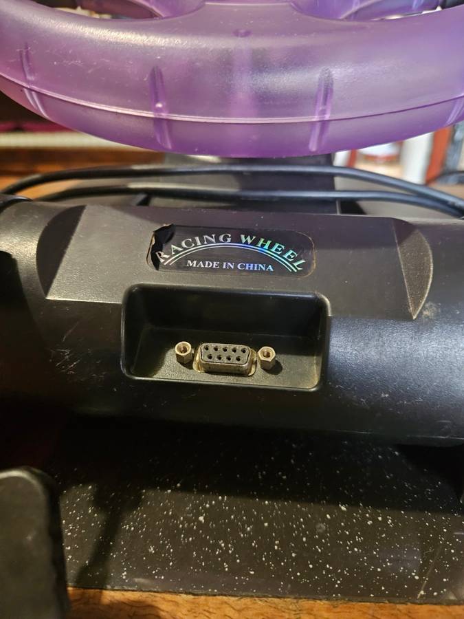 Sony PlayStation 2 with Expansion Box + a Steering Wheel