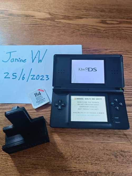 Rare Nintendo DS IQue with R4 card loaded with games