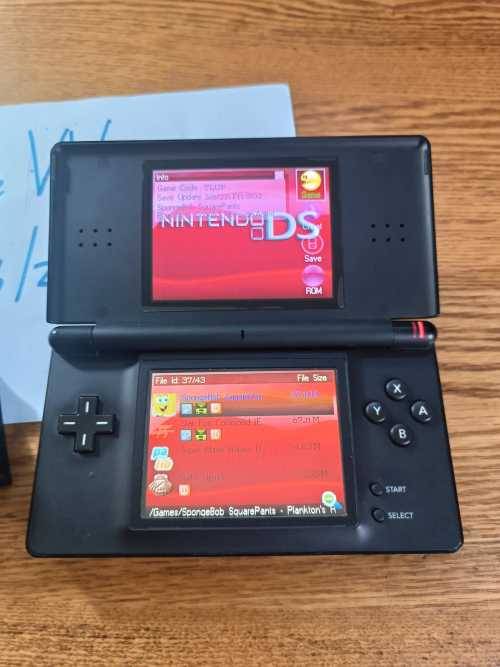 Rare Nintendo DS IQue with R4 card loaded with games