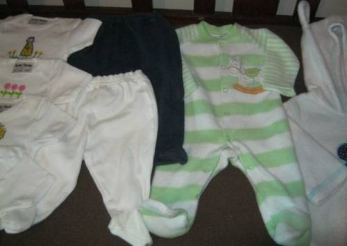 Lot of 11 babies' clothing, all newborn but 1 - R13.64 per item.