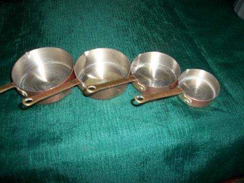 COPPER MEASURING PANS X 4