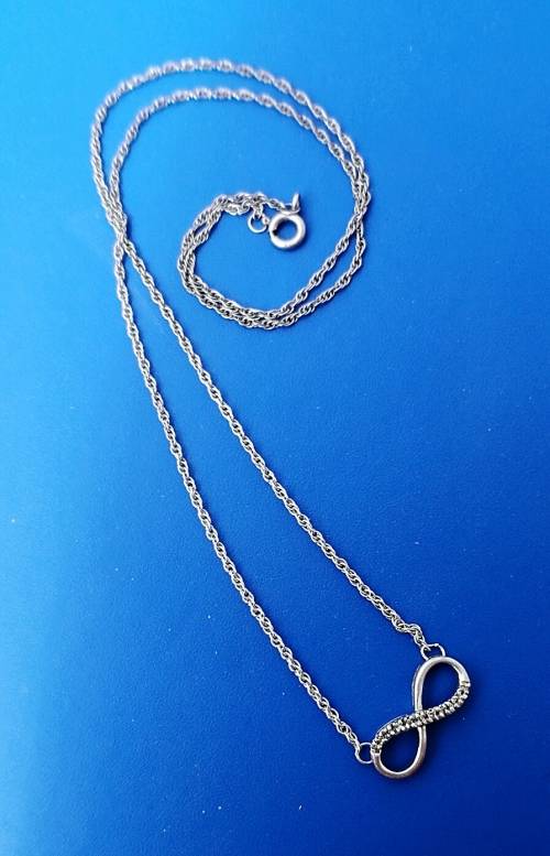 Silver chain and infinity pendant with diamonds###