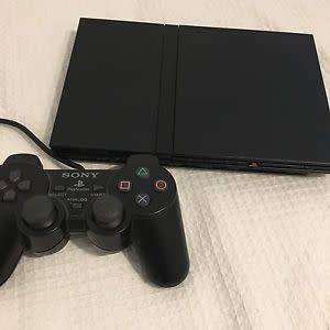 PS2 Console + Controller + 5 Games