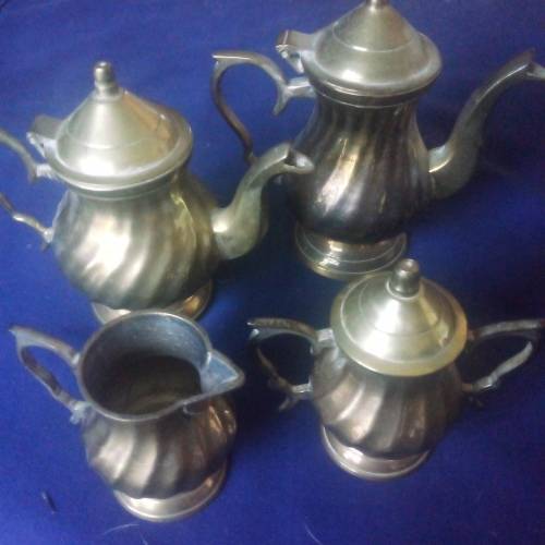 ORNAMENTAL BRASS TEA AND COFFEE SET