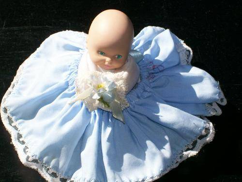 LOVELY SEATED BABY DOLL