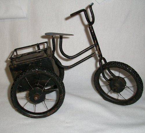 Tricycle for your dolls or bears.