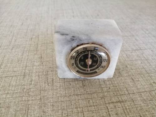 Thermometer set in marble