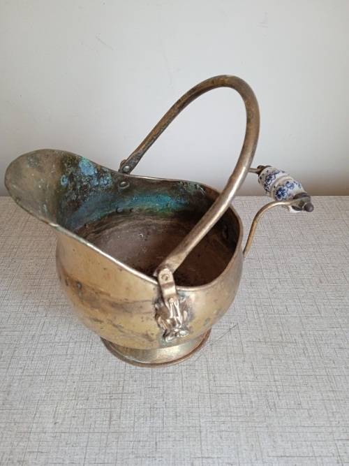 Antique brass coal scuttle helmet in need of TLC