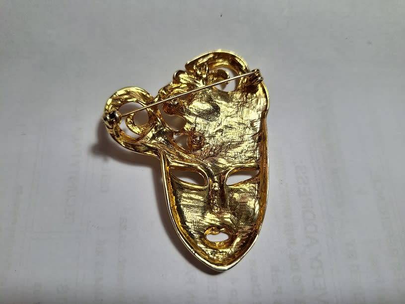 Large mask brooch