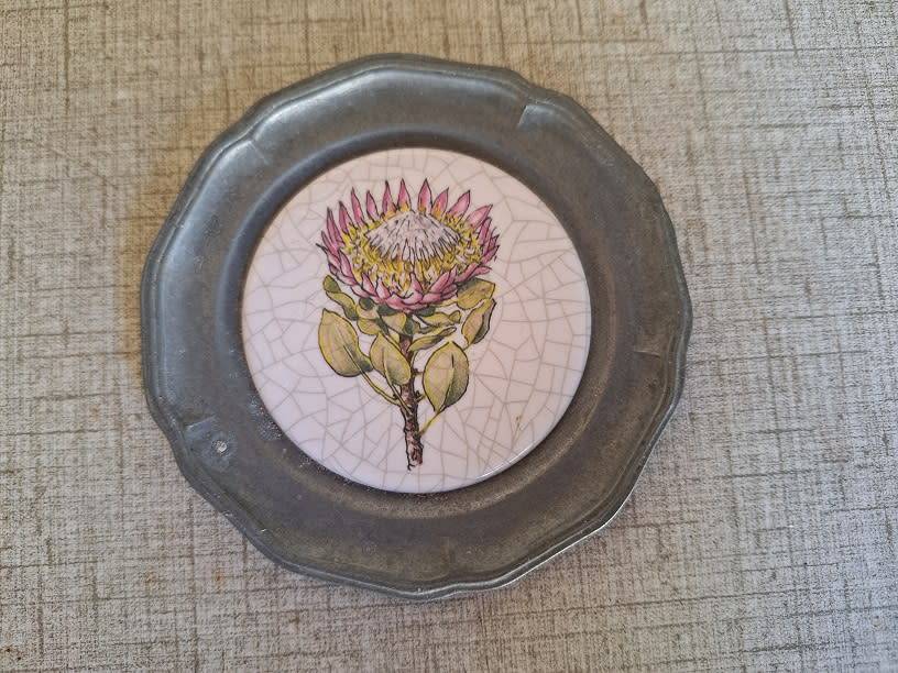 Small pewter???? and tile wall plate