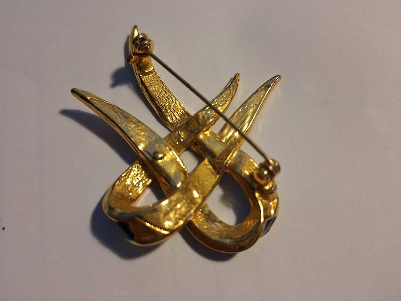 Blue and green enameled brooch