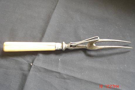 BONE HANDLE CARVING FORK WITH HALLMARKED SILVER TRIM