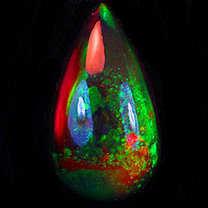 OPAL-2.05cts Unique!Phenomenal Splashes of Rainbow ! SOLID BLACK WELO OPAL