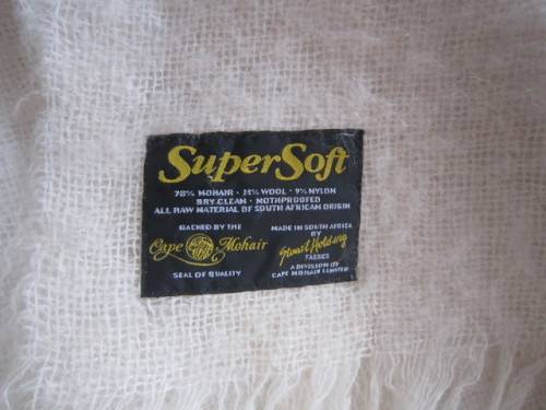 CREAM MOHAIR BLANKET BY STUART HOLDING  ITEM NO 2019