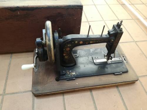 Antique sewing machine with box