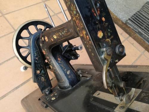 Antique sewing machine with box