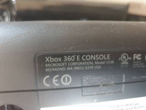 Xbox 360 E slim black console with 2 controls and Kinect in box