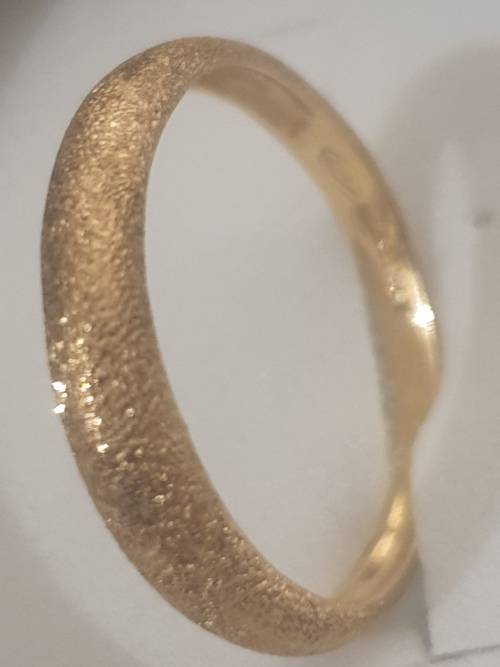18ct wedding band- made to look rough on top