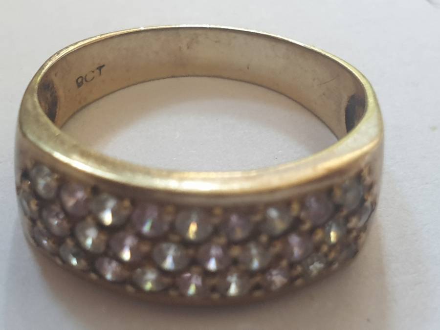 Pretty 9ct yellow gold with 3 rows channel band setting of pink and white stone ring