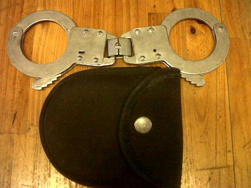 VIntage pair of handcuffs with keys