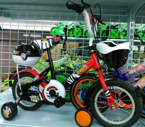 KIDDIES ZEBRA BICYCLE WITH FRONT BASKET AND BACK CARRY CASE INCLUDING MUD GUARDS AND TRAINER WHEELS