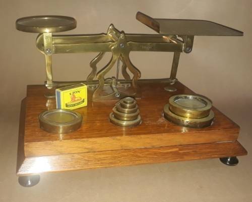 Antique Brass and Wood Postal Scale with 8 Weights