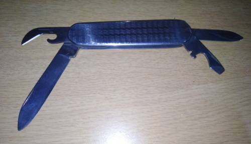 A Paper Knife and Mikov Pocket Knife with Fold Away Blades and Tools