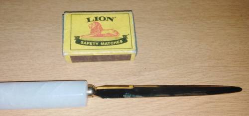 A Paper Knife and Mikov Pocket Knife with Fold Away Blades and Tools