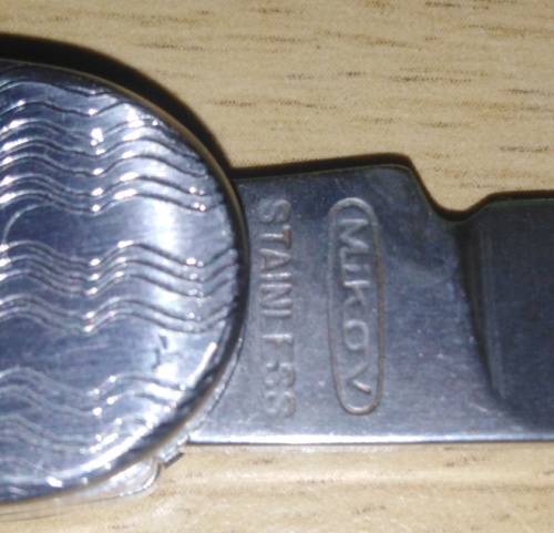 A Paper Knife and Mikov Pocket Knife with Fold Away Blades and Tools