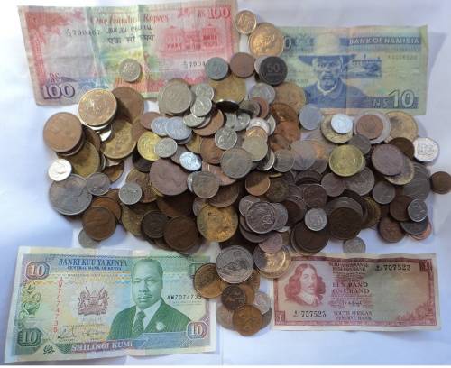 Collection of over 250 World Coins & Banknotes including 11 Silver Coins