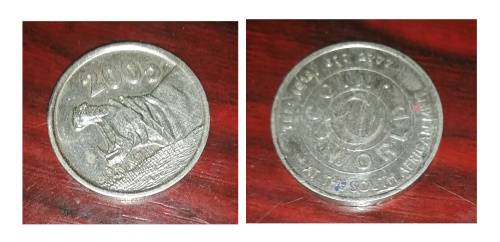 A Collection of notes from  Swaziland, Indonesia and coins from ZAR, SA and America