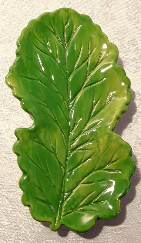 Striking small leaf serving dish. Hand made and painted from Portugal.