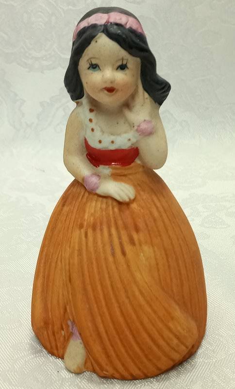 Vintage Polynesian Girl Bell.